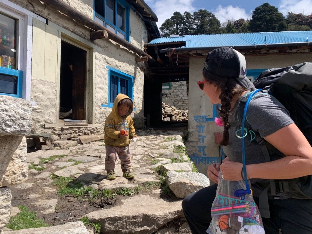 Bringing children toys in Namche Bazaar